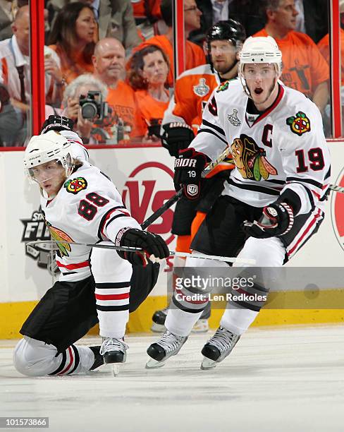 Patrick Kane and Jonathan Toews of the Chicago Blackhawks celebrate Kane's goal at 2:50 of the third period against the Philadelphia Flyers in Game...