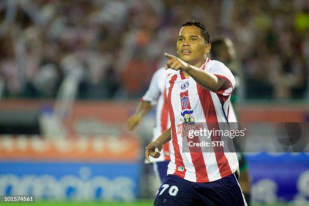 Junior's Carlos Bacca celebrates after scoring against La Equidad during the Colombian Soccer League final match in Barranquilla on June 02, 2010....