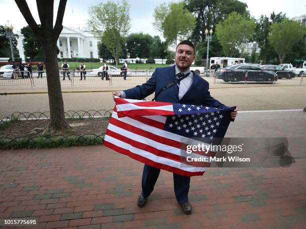 Jason Kessler, who organized the rally, speaks as white supremacists, neo-Nazis, members of the Ku Klux Klan and other hate groups, speaks during the...