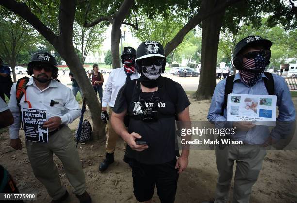 White supremacists, neo-Nazis, members of the Ku Klux Klan and other hate groups, gather for the Unite the Right rally in Lafayette Park across from...