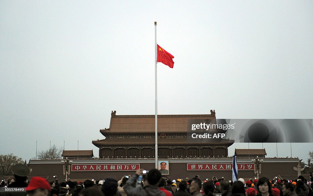 Visitors gather at Tiananmen Square in B