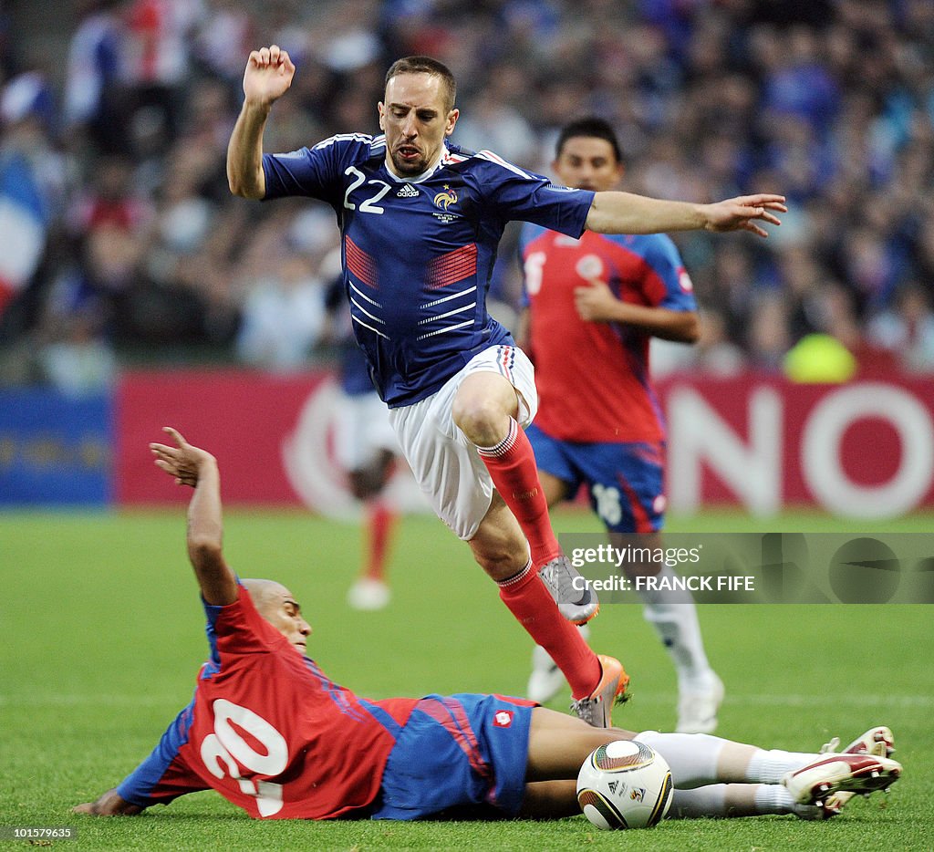 French forward Franck Ribery (up) vies w