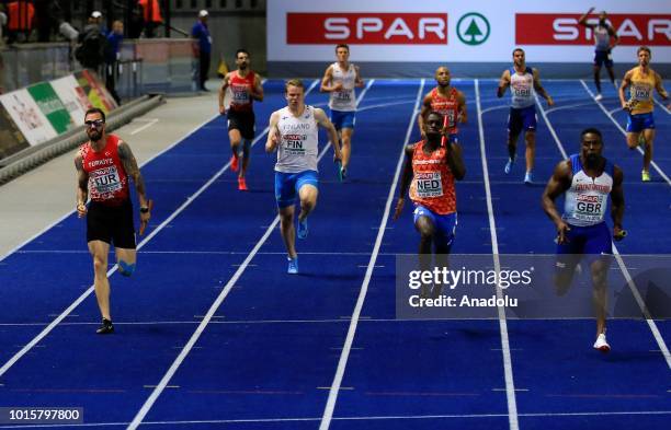 Athletes compete in men's 4x100m relay final during the 2018 European Athletics Championships in Berlin, Germany on August 12, 2018.