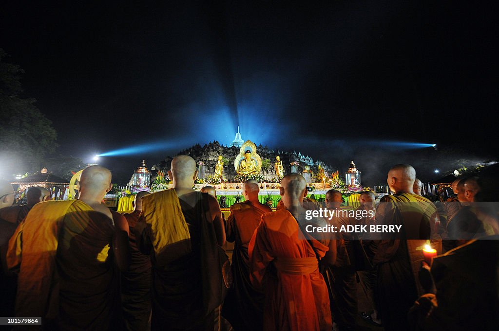 Indonesian monks hold prayers during the