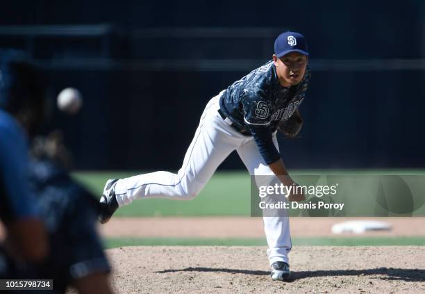 Kazuhisa Makita of the San Diego Padres pitches during the ninth inning of a baseball game against the Philadelphia Phillies at PETCO Park on August...