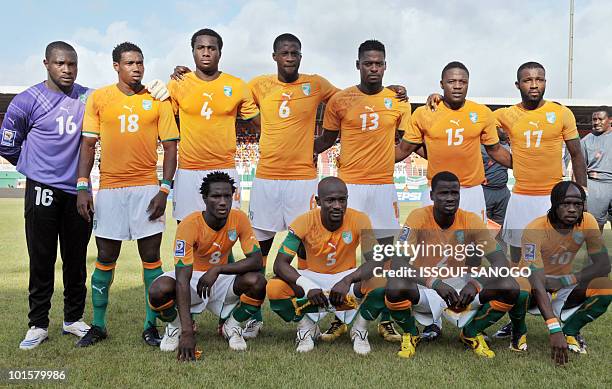 Ivory Coast national footbal team players: Angoua Brou, Didier Zokora, Emmanuel Eboue and Gervais Kouassi; and : Aristide Zogbo, Kader Keita,...