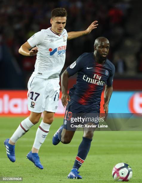 Lassana Diarra of Paris Saint-Germain in action with Jessy Deminguet of SM Caen during the Ligue 1 match between Paris Saint Germain and SM Caen at...