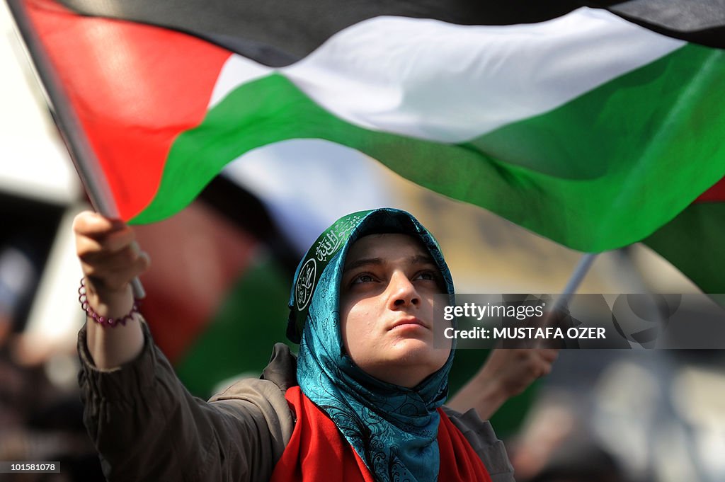 A Turkish demonstrator carries a Palesti