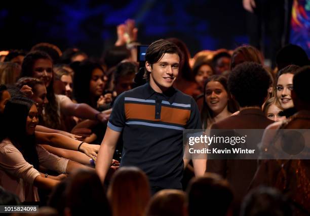 Actor Nick Robinson accepts the Choice Comedy Movie for "Love, Simon" onstage during FOX's Teen Choice Awards at The Forum on August 12, 2018 in...