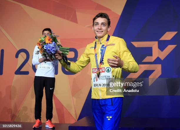 Swedish athlete Armand Duplantis celebrates after winning the golden medal in pole vault during the 2018 European Athletics Championships in Berlin,...