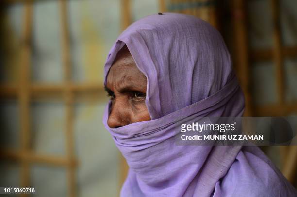 This photograph taken on July 19, 2018 shows a member of the Shanti Mohila , a group of Rohingya refugee women who have formally requested the...