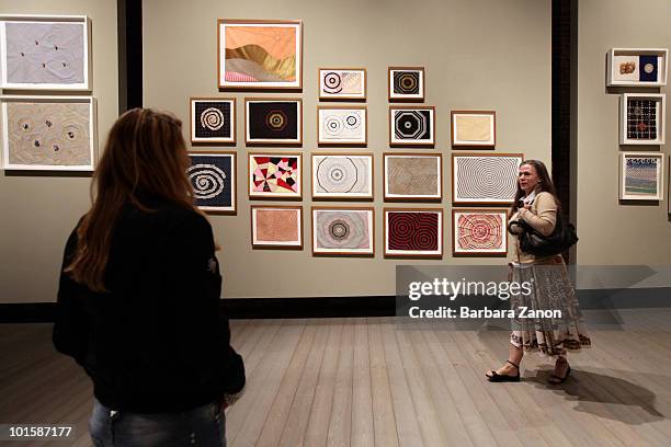 An attendee views works by Louise Bourgeois, during Louise Bourgeois "The fabric works" preview, at Fondazione Emilio Vedova on June 3, 2010 in...