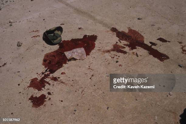 Fresh blood of an Amal militia men who died instantly after a mortar attack coming from Bourj el-Barajneh Palestinian refugee camp in the southern...