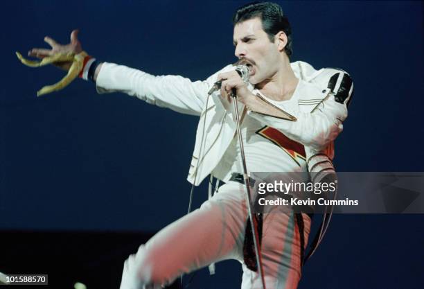 Singer Freddie Mercury of rock band Queen performs on stage at Elland Road football stadium in Leeds, England on May 29, 1982.