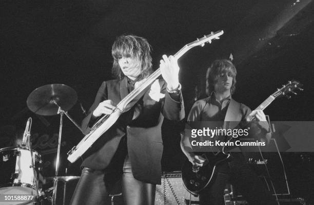Singer Chrissie Hynde and guitarist James Honeyman-Scott of The Pretenders perform on stage at Eric's in Liverpool, England in March 1979.