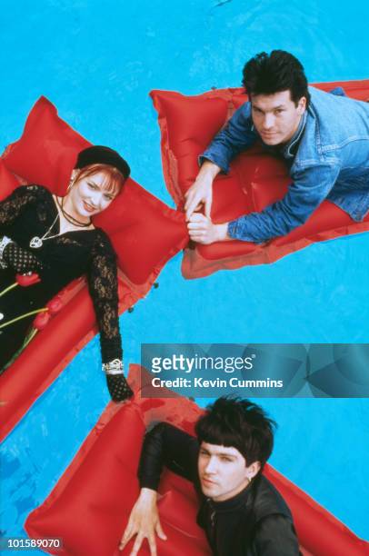 Singer Tracy Tracy , drummer Tig Williams and guitarist PJ Court of British indie band The Primitives in 1989.