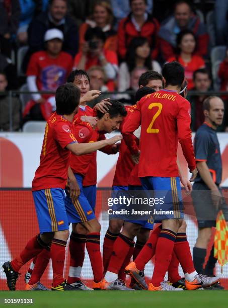 Jesus Navas of Spain celebrates scoring the opening goal with his teammates during the International Friendly match between Spain and South Korea at...