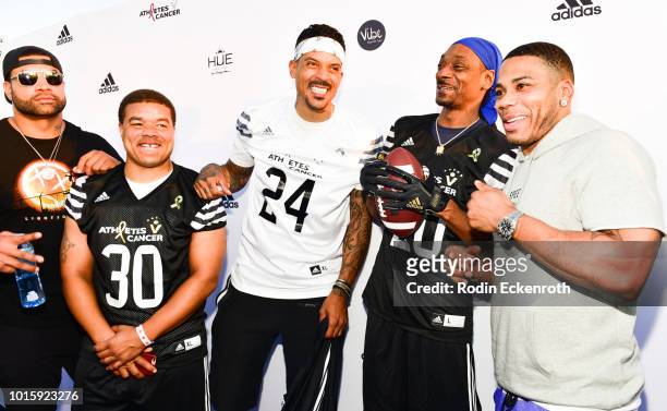 Shawne Merriman, Red Grant, Matt Barnes, Snoop Dogg, and Nelly arrive at the 5th Annual Athletes vs Cancer Celebrity Flag Football Game at Fairfax...