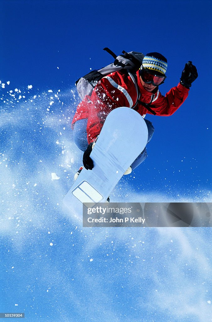 MAN SNOWBOARDING, BRECKENRIDGE