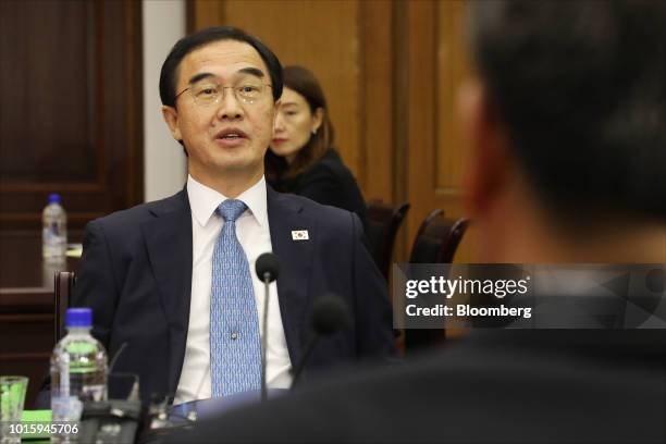 Cho Myoung-gyon, South Korea's unification minister, left, speaks to Ri Son Gwon, chairman of North Korea's Committee for the Peaceful Reunification...