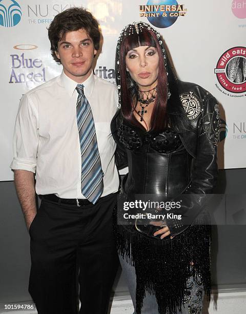 Actor Jake White and Cher impersonator Lissa Negrin attends "Celebrate 5 Decades Of Music" Benefit For The Homeless For "Out 2 Connect" with Gay &...