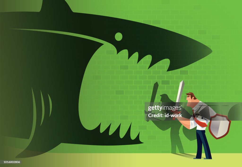 Armed businessman defending angry shark