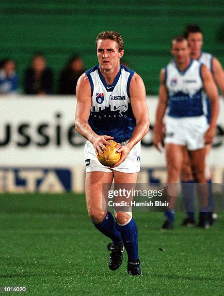 Matthew Capuano of North Melbournein action during the pre season Ansett Cup match between North Melbourne and Brisbane at Waverley Park, Melbourne,...