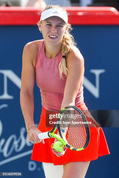 Caroline Wozniacki serves the ball during her second round match at WTA Coupe Rogers on August 9, 2018 at IGA Stadium in Montréal, QC