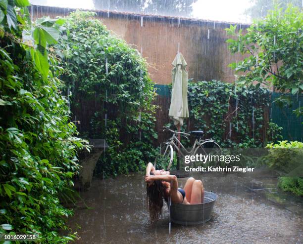 summer rain - woman shower bath imagens e fotografias de stock