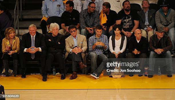 Legend Jerry West, Actor Sylvester Stallone, Producer Jeffrey Katzenberg and Director Steven Spielberg watch as the Los Angeles Lakers take on the...