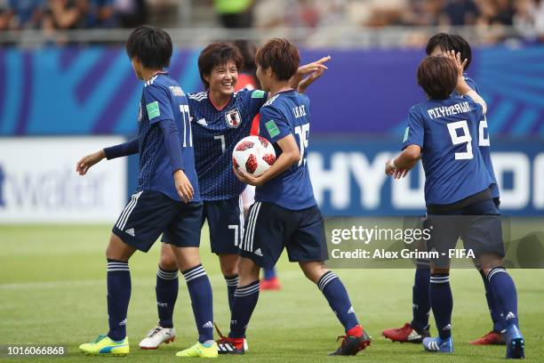 Riko Ueki of Japan celebrates her team's fourth goal with team mates during the FIFA U-20 Women's World Cup France 2018 group C match between Japan...