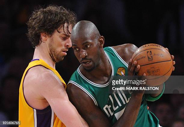 Lakers forward Pau Gasol blocks Boston Celtics player Kevin Garnett before the LA Lakers went on to win 102-89 in game one of the NBA finals at the...
