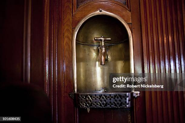 An original brass water tap is fitted near a stairway on the 220-foot steamboat "Ticonderoga," the last remaining paddlewheel passenger steamboat in...