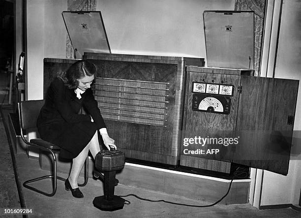 Picture dated October 1947 of the "Radio-gram de Luxe", presented at the Radio Exhibition, in London. The world's first transistor was invented in...