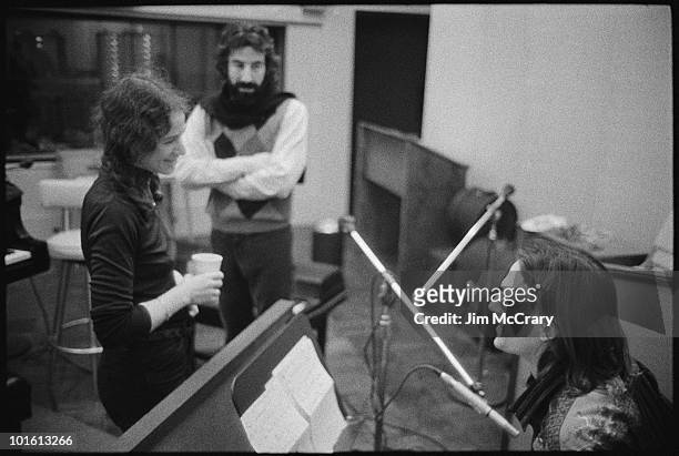Singer-songwriter Carole King with record producer Lou Adler and James Taylor during the recording of her album 'Tapestry' at A&M Records Recording...