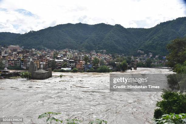 Flooded Beas river with its contributory Suketi Khad after heavy rainfall on August 13, 2018 in Mandi, India.