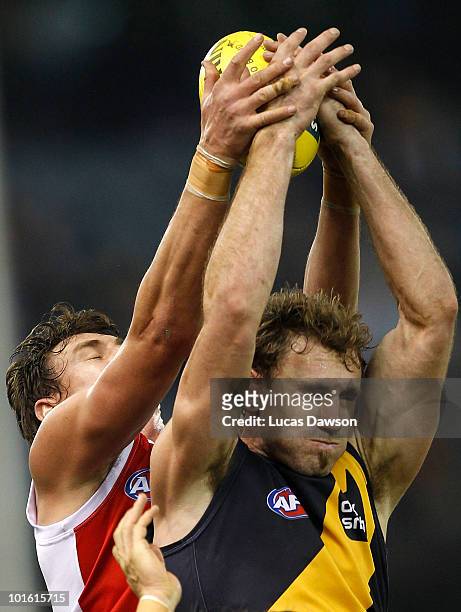 Shane Tuck of the Tigers attempts a mark during the round 11 AFL match between the Richmond Tigers and the St Kilda Saints at Etihad Stadium on June...