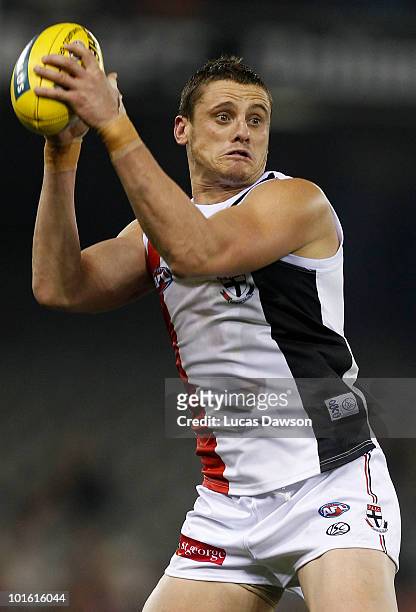 Michael Gardiner of the Saints marks the ball during the round 11 AFL match between the Richmond Tigers and the St Kilda Saints at Etihad Stadium on...