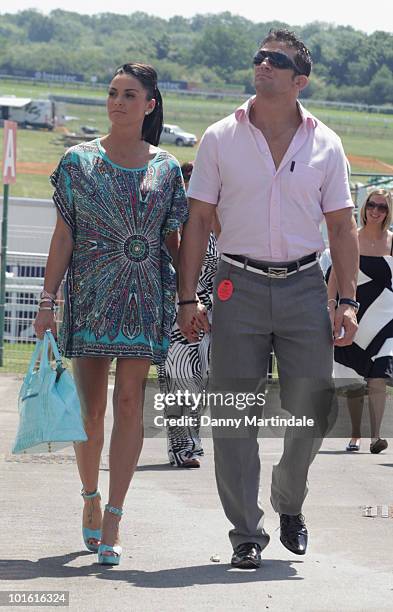 Katie Price aka Jordan and Alex Reid attend the Investec Ladies Day at Epsom Downs on June 4, 2010 in Epsom, England.