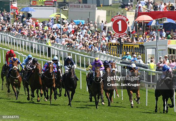 Tartan Gigha ridden by jockey Kieren Fallon wins The Investec Mile during Ladies Day at Epsom Racecourse on June 04, 2010 in Epsom, England