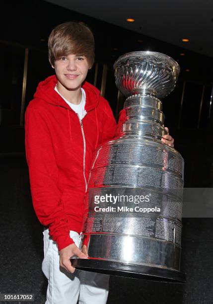 Singer Justin Bieber holds the Stanley Cup before performing on NBC's TODAY Show on June 4, 2010 in New York City.