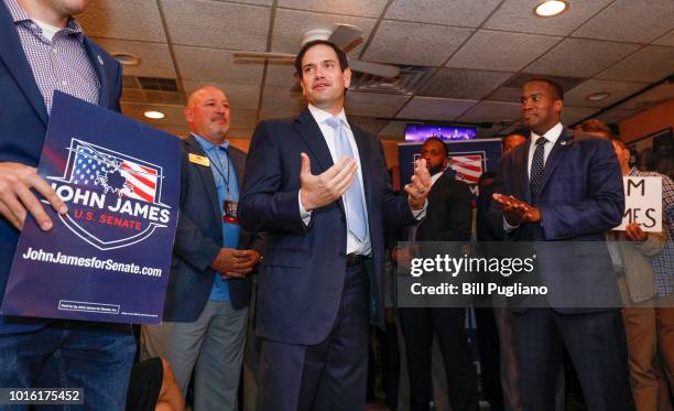 Michigan GOP U.S. Senate candidate John James campaigns with the help of Sen. Marco Rubio at Senor Lopez Restaurant August 13, 2018 in Detroit,...