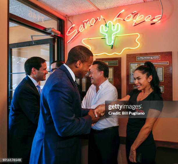 Michigan GOP U.S. Senate candidate John James campaigns with the help of Sen. Marco Rubio at Senor Lopez Restaurant August 13, 2018 in Detroit,...