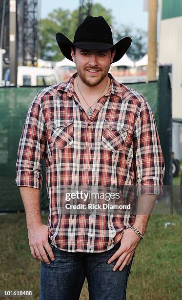 Singer/Songwriter Chris Young backstage during the 2010 BamaJam Music & Arts Festival at the corner of Hwy 167 and County Road 156 on June 3, 2010 in...