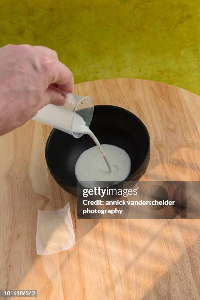 whole milk and gelatin powder. - volume fluid capacity stock pictures, royalty-free photos & images