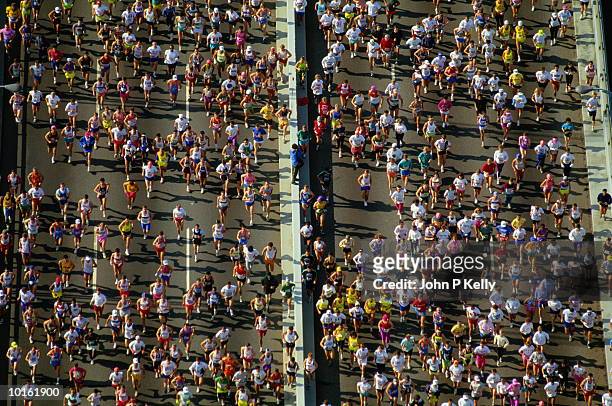 aerial runners new york city marathon - fun run stock pictures, royalty-free photos & images