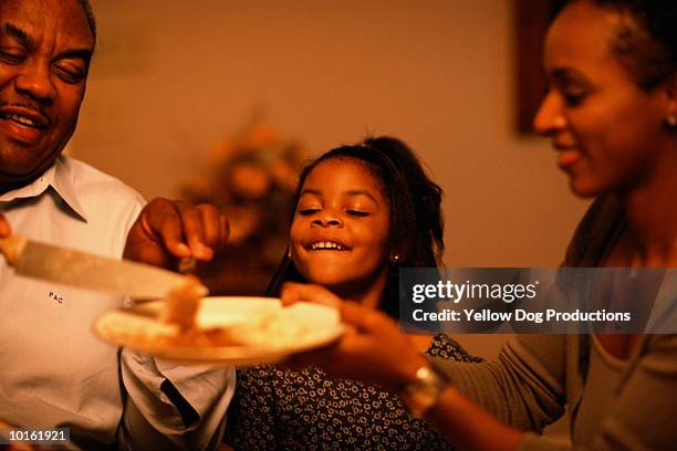 family holiday dinner, christmas - black couple dining stockfoto's en -beelden