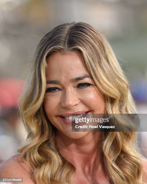 Denise Richards visits "Extra" at Universal Studios Hollywood on August 13, 2018 in Universal City, California.