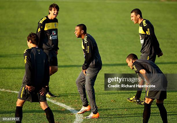 Robinho jokes with Kaka, Lucio and Daniel Alves action during the Brazil training session at Randburg High School on June 4, 2010 in Johannesburg,...