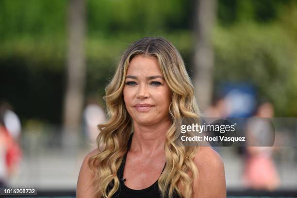Denise Richards visits "Extra" at Universal Studios Hollywood on August 13, 2018 in Universal City, California.